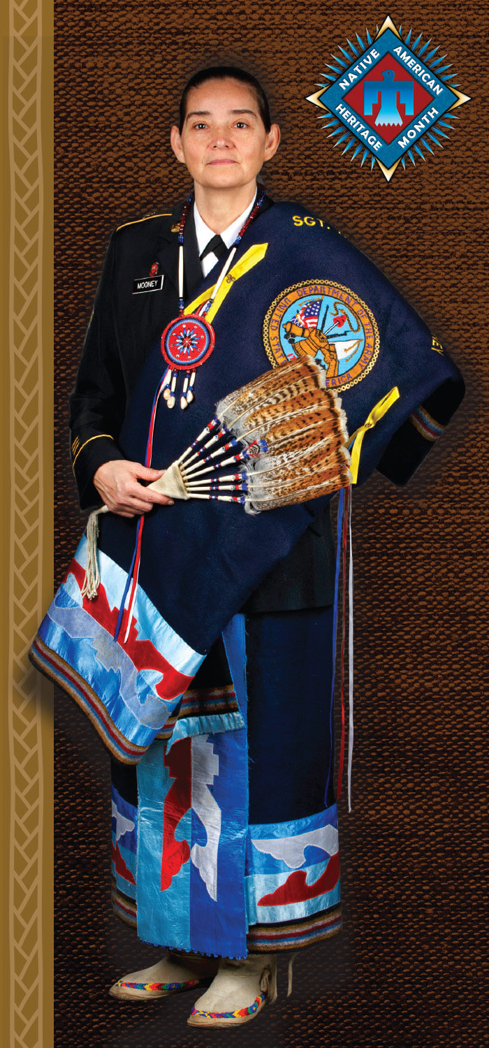 SFC Debra Mooney (Ret.) wearing official Oklahoma National Guard Native American regalia draped over her Army Service Uniform.