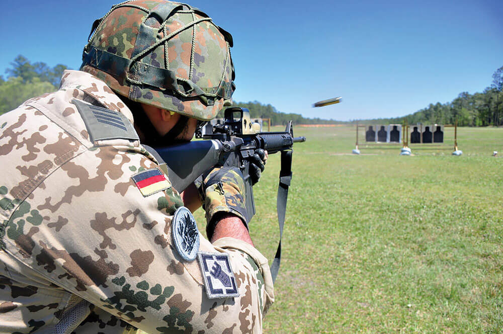 Spa. Kristopher Nailor assigned to the German Armed Forces Command, engages several targets during the multi-stage combat rifleman portion of the competition.