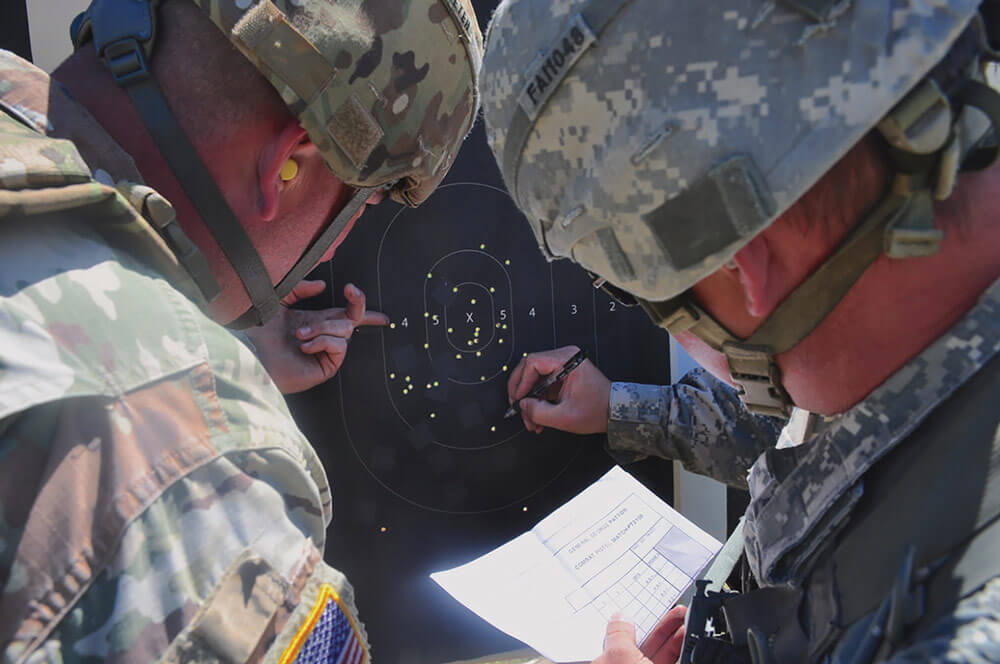 Competing Soldiers examine targets during the competition.