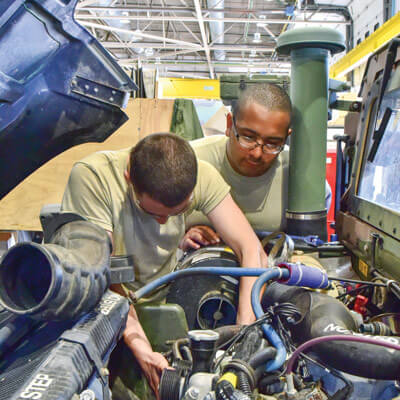 Soldiers of Michigan National Guard perform vehicle maintenance at Camp Grayling's Maneuver Area Training Equipment Site during ONS 2017.