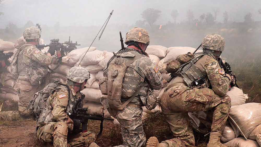 A Company, 1-125 Infantry Battalion, Michigan National Guard participates in a live fire company attack.