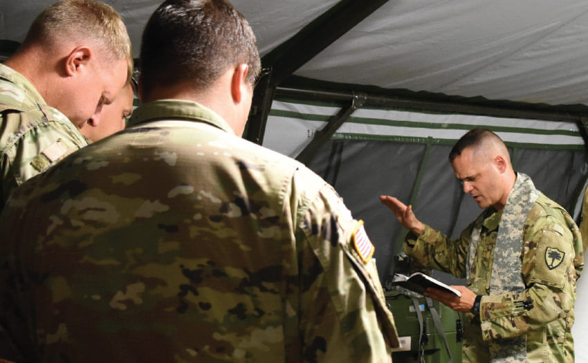 Chaplin (MAJ) Brandon Candee conducts chapel services during annual training at Fort Stewart, Ga.