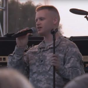 SGT Mark Meier sings a solo with Musical Performance Team, the Sidewinders.