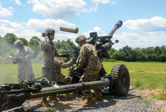 Instructors of the 166th Regional Training Institute located at Fort Indiantown Gap, the only live-fire, maneuver military training facility in Pennsylvania, offering more than 17,000 acres and 140 training areas and facilities, train National Guard Soldiers on an M119 Howitzer.