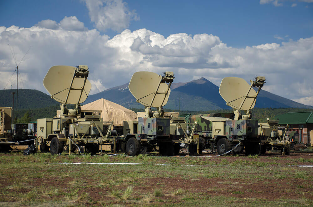 Satellite Transportable Terminals from the 365th Signal Company, aim towards communications satellites at the beginning of the unit’s annual training at Camp Navajo, Ariz.