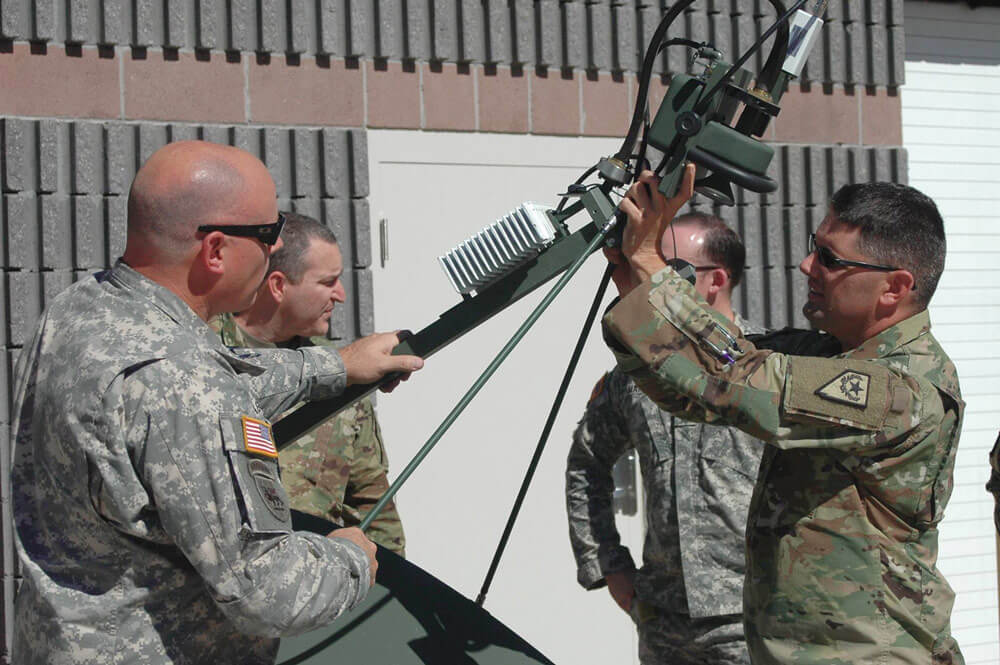 SFC Class Ron Seagraves, left, and SGT 1st Class Ken Hodes, both of Joint Force Headquarters in Carson City, Nev., prepare DIRECT equipment for transport to Puerto Rico.