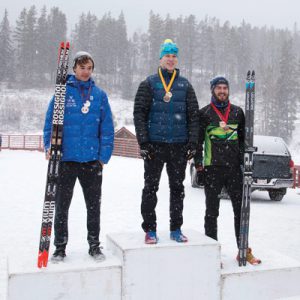 SPC Travis Cooper claims his second gold after completing the junior men’s 12.5 km mass start in the North American #1 and Calforex #1 Biathlon Cups at the Canmore Nordic Centre Provincial Park in Canmore, Alberta