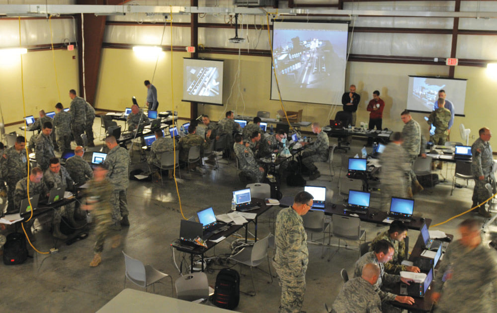 National Guard Soldiers and Airmen operate as blue team defenders in the Cyber City area of operations during exercise Cyber Shield 2016 at Camp Atterbury, Ind.