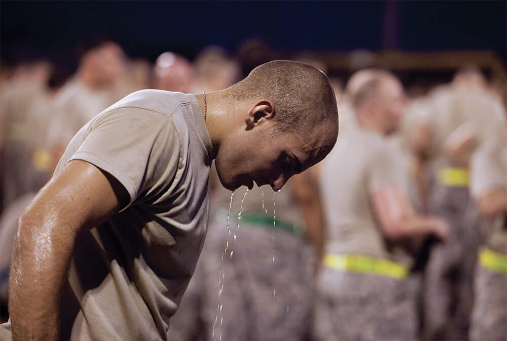 An ROTC Soldier cools off after a run during the Air Assault Course taught at the Warrior Training Center. U.S. Army Maneuver Center of Excellence photo by Ashley Cross.