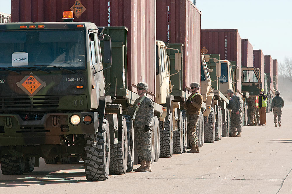 Soldiers offload shipping containers in McAlester, Okla., during Operation Golden Patriot – the California Army National Guard-led portion of Patriot Bandoleer 2017. Army National Guard photo by SSG Eric McDonough.