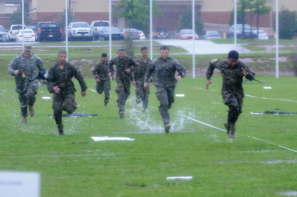 Nevada Army National Guard Calvary Scouts make their final sprint to the finish line in the pouring rain at the last event of the 2017 Gainey Cup. Nevada Army National Guard photo by SGT Walter H. Lowell.