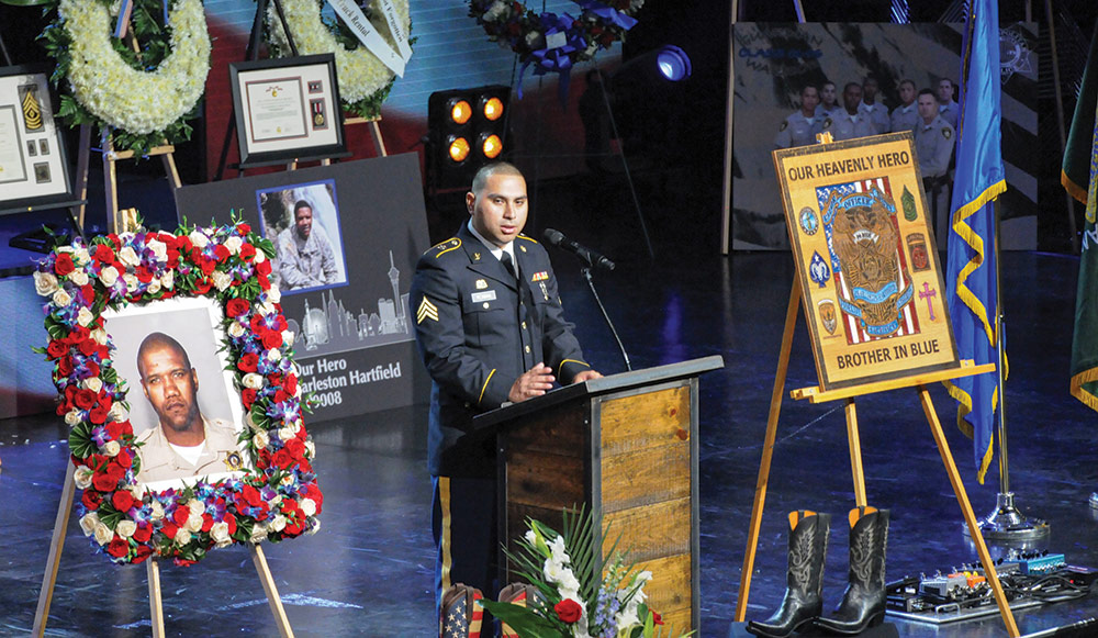 SGT Abdiel Roman, 100th Quartermaster Company, speaks at the memorial service for 1SG Charleston Hartfield on Oct. 20, 2017. Nevada Army National Guard photo by SSG Victor Joecks.