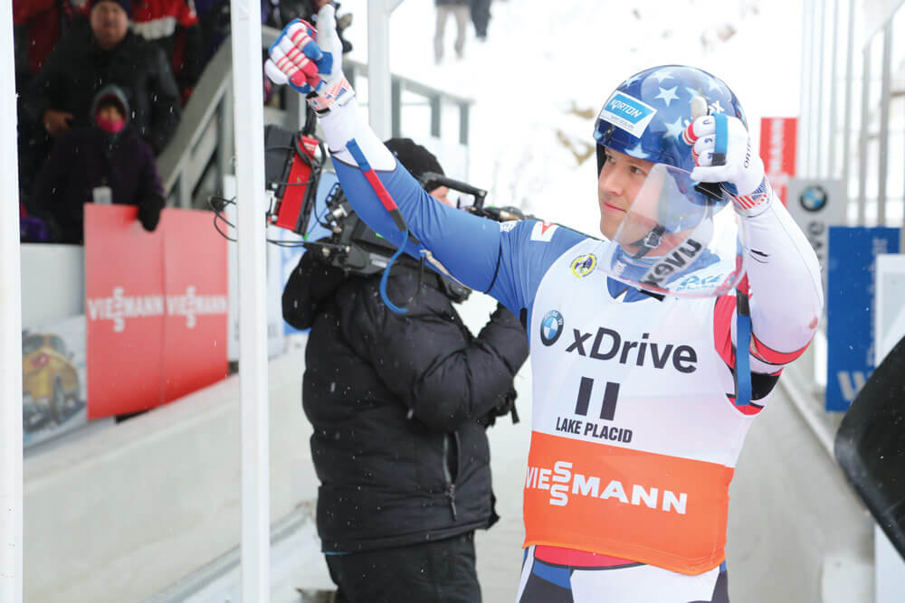 SGT Matthew Mortensen gives a “thumbs up” to fans at the 2017 World Cup competition in Lake Placid, N.Y. U.S. Army photo by SPC Jennily Leon