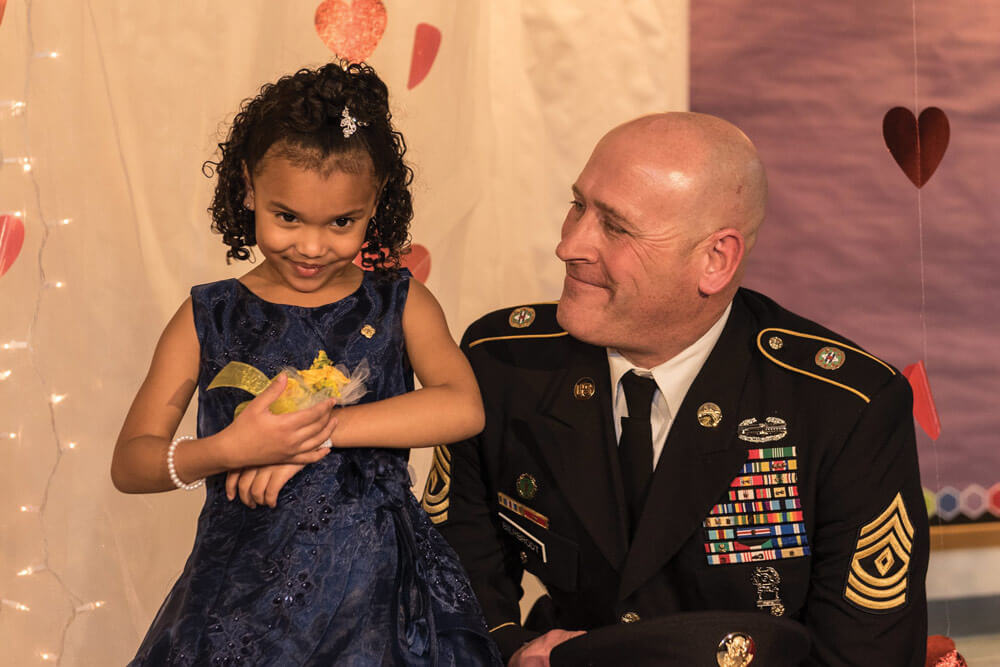 Illinois Soldier Escorts Gold Star Daughter to School Dance thumbnail image