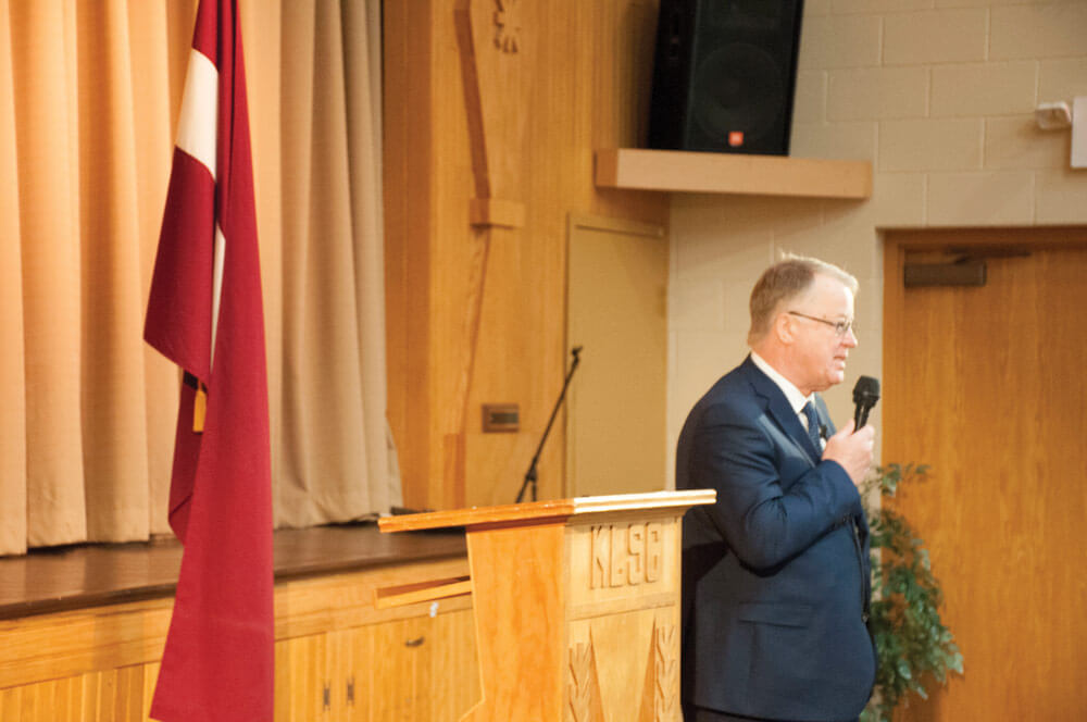 Guntis Ulmanis, former president of the Republic of Latvia, speaks at a Latvian-American community center in Kalamazoo, Michigan, about the 25-year State partnership between Latvia and Michigan. National Guard photo by 2LT Andrew Layton