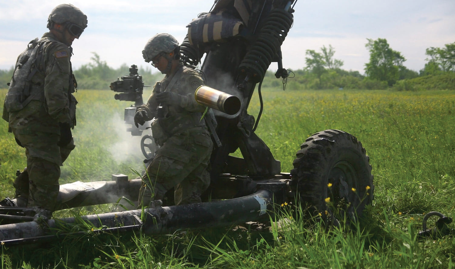 U.S. Soldiers assigned to Alpha Battery, 1st Battalion, 258th Artillery Regiment, 27th Infantry Brigade Combat Team, New York Army National Guard, man an M119A2 Howitzer during a notional air assault artillery raid where Soldiers engaged a simulated enemy target at Fort Drum, N.Y. New York Army National Guard photo by SGT Alexander Rector
