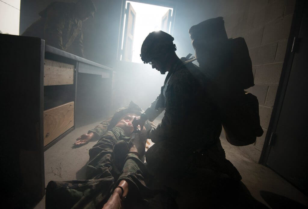 A Soldier performs emergency first aid during a simulated event while participating in the Region One Best Warrior Competition in Westhampton Beach, N.Y. National Guard photo by SSgt Christopher S. Muncy