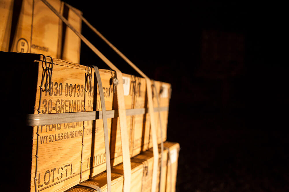 Crates of hand grenades await divestment from U.S. Army personnel to Iraqi security forces at Qayyarah West Airfield, Iraq. U.S. Army photo by CPL Rachel Diehm