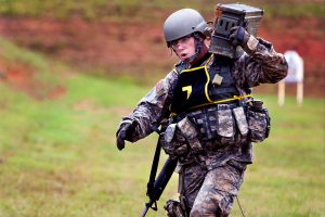 Then-SSG, now SFC Beau Detrick, Illinois Army National Guard, carries a fully loaded ammunition box during the National Guard Best Warrior Competition at Fort Benning, Ga., July 31, 2012. U.S. Army photo by Ashley Cross