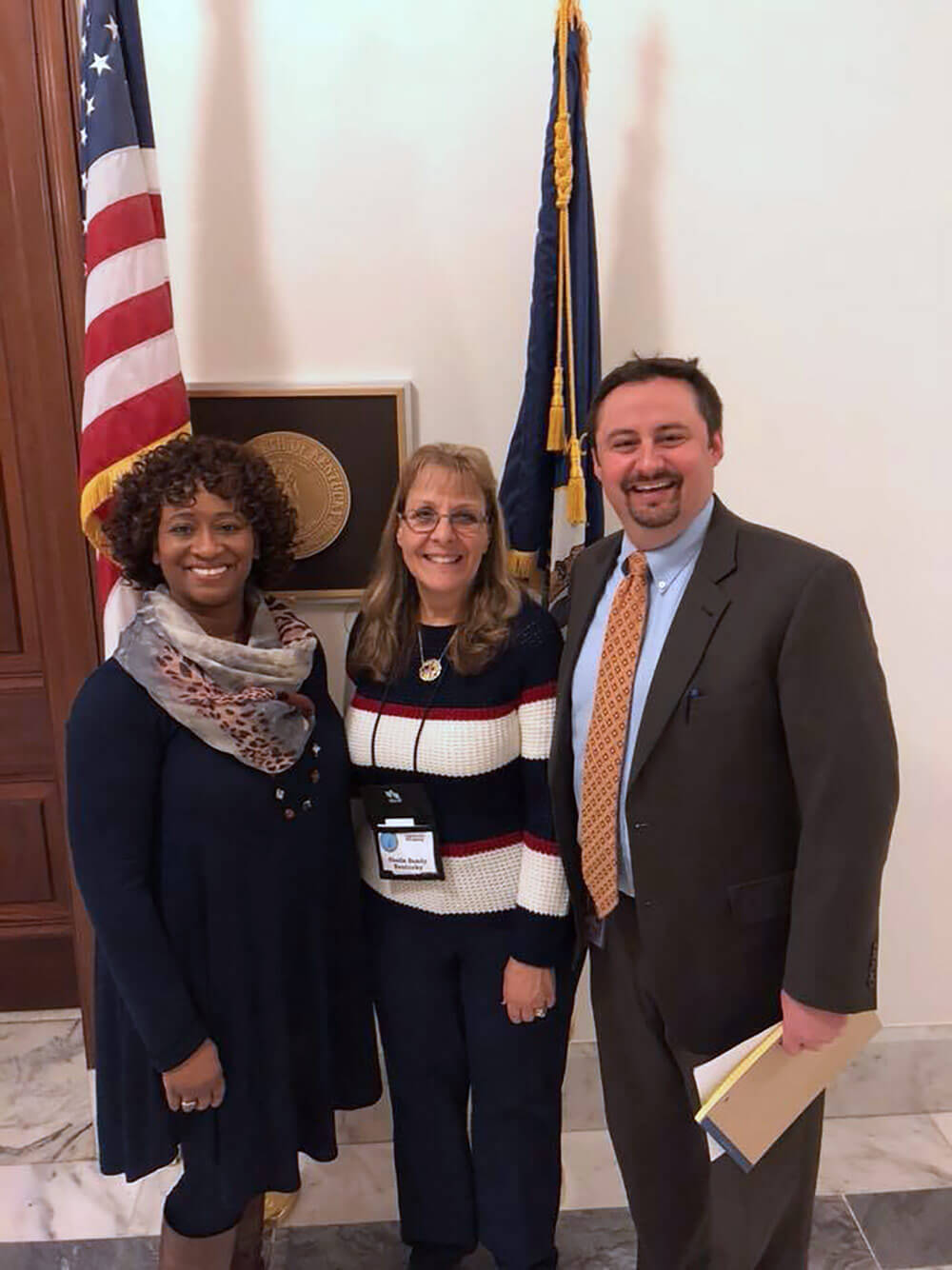 Shelia Brookins (left) and Shelia Bandy, working as representatives of the Enlisted Association of the National Guard of Kentucky (EANGKY), visit with Brett King, a military legislative assistant in the Office of Sen. Rand Paul and other Kentucky congressional representatives to discuss initiatives supporting Kentucky State military affairs, Feb. 9, 2018. Photo courtesy Enlisted Association of the National Guard of Kentucky