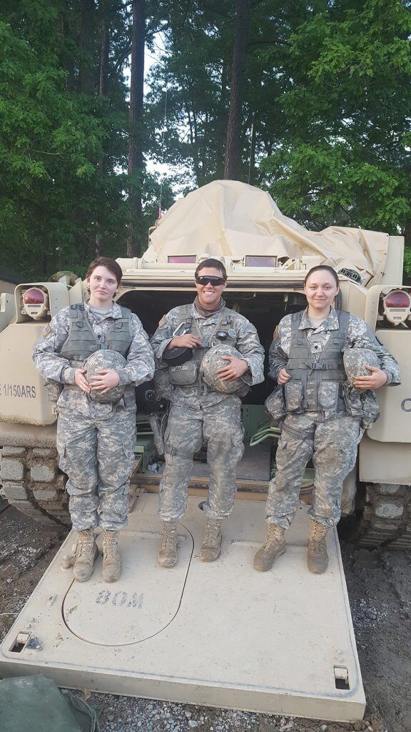 1LT Emily Lilly (center) pictured during the West Virginia Army National Guard 2017 AT with SPC Pauline Cole (left) and SPC Rashanda Blake (right), the first and third, respectively, female 91M (Bradley Fighting Vehicle system maintainers) in the National Guard. Photo courtesy 1LT Emily Lilly