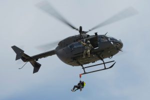 An Oklahoma Army National Guard UH-72 helicopter crew, working as members of Oklahoma Task Force One, perform a mock rescue over the Oklahoma River during a joint water rescue training, April 5, 2018. Oklahoma Army National Guard photo by MAJ Geoff Legler