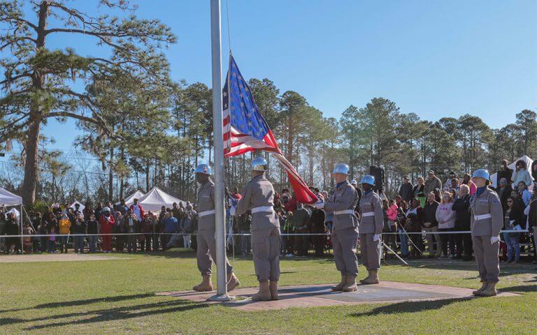Students from the Georgia National Guard Youth ChalleNGe Academy’s Color Guard raise the U.S. Flag during the academy’s Family Day. Georgia Army National Guard photo by SSG R.J. Lannom Jr.