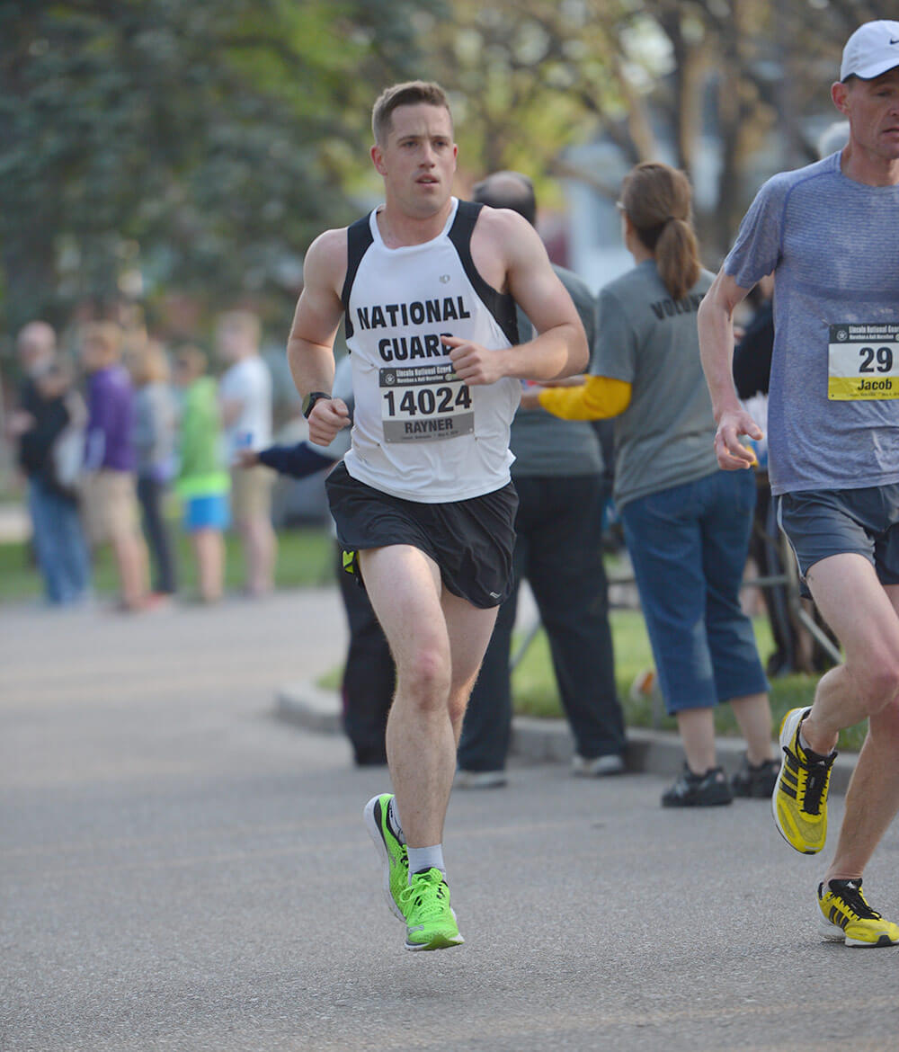 CPT Kenneth Raynor runs the race course winding through the city of Lincoln, Neb., to take first place in the men’s category of the 2018 Lincoln National Guard Marathon. Nebraska National Guard photo by A1C Jamie Titus
