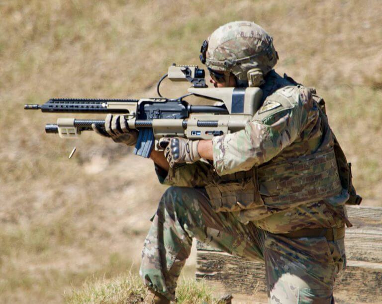 1LT William Renfroe fires the AimLockTM Stabilized Weapon Platform during a live fire drill as part of the 2017 Army Expeditionary Warrior Experiments at Fort Benning, Ga. U.S. Army photo by Angie DePuydt