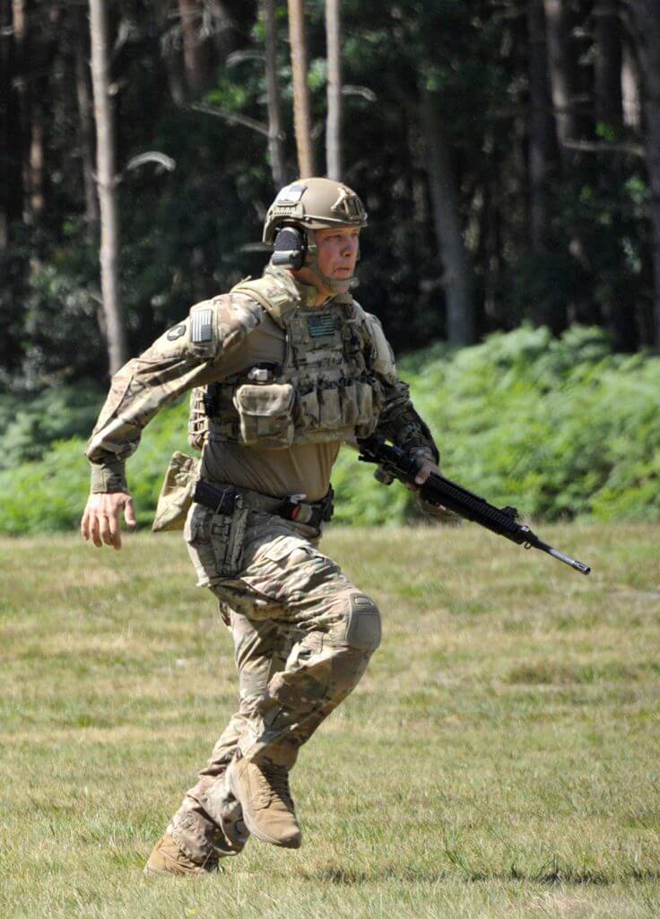 SFC Paul Deugan, All Guard International Combat Team member from the Iowa Army National Guard, sprints 300 meters to the firing line before engaging targets 100–300 meters away while competing in the 2018 UK Defence Operational Shooting Competition. Arkansas Army National Guard photo by MAJ Theresa Austin