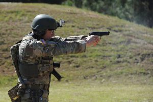 SGT Justus Densmore, Texas Army National Guard, engages a target during the Multi-gun Match at the 2018 U.S. Army Small Arms Championships March 11–17, 2018, at Fort Benning, Ga.