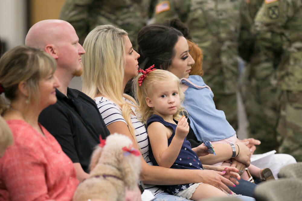 Family members of Arizona Army National Guard Soldiers from Detachment 1, 856th Military Police Company participate in a send-off ceremony at Allen Readiness Center, where they say goodbye to the Soldiers who are deploying to Afghanistan in support of Operation Freedom’s Sentinel. Arizona Army National Guard photo by SSG Adrian Borunda