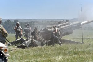 A group of Soldiers from the 1st Battalion, 117th Field Artillery Regiment, Alabama Army National Guard – which is assigned to the 142nd Field Artillery Brigade – prepare to fire an M777 Towed Howitzer during Operation Western Strike 2018 at Camp Guernsey, Wyo. Arkansas Army National Guard Photo by SSG Kelvin Green