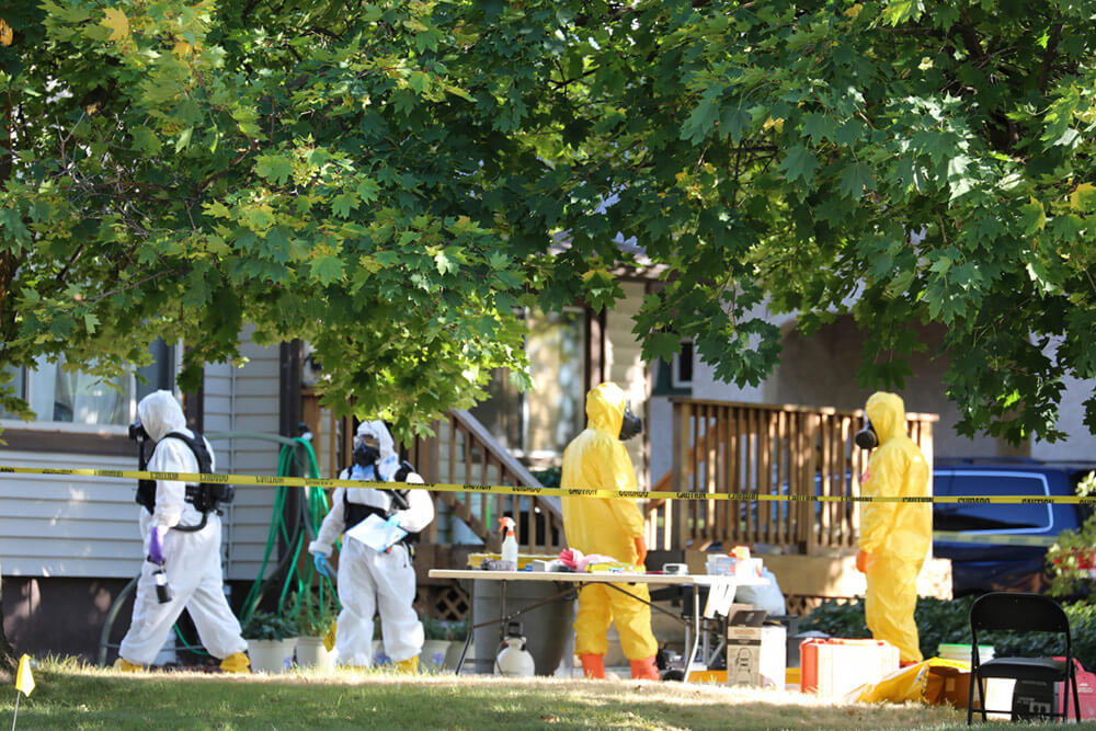 Members of the Utah National Guard's 85th Weapons of Mass Destruction-Civil Support Team assist federal investigators in Logan, Utah, during a probe of ricin-tainted mail sent to U.S. officials in October 2018.