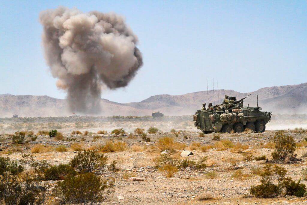 A Stryker crew with Alpha Company, 2nd Battalion, 112th Infantry Regiment, 56th Stryker Brigade Combat Team, 28th Infantry Division, Pennsylvania Army National Guard begin their patrol by heading deep in to the “box,” a simulated battlefield at the National Training Center, Fort Irwin, Calif. Pennsylvania Army National Guard photo by SGT Shane Smith