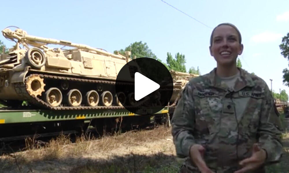 In support of Operation Western Strike Crewmembers of the 142nd Field Artillery Brigade, Arkansas National Guard, load tracked armored vehicles onto railcars for the first time since Operation Desert Storm. (U.S. Army National Guard video by Staff Sgt. James Heuston)