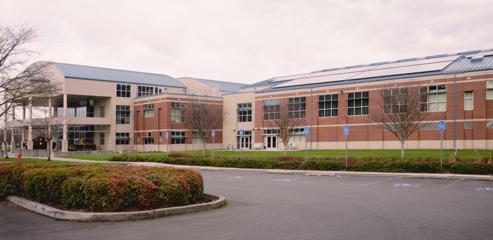 The Armed Forces Reserve Center at Camp Withycombe, Ore., shown with new solar panels visible on the roof. Oregon Army National Guard photo by SGT John Hughel