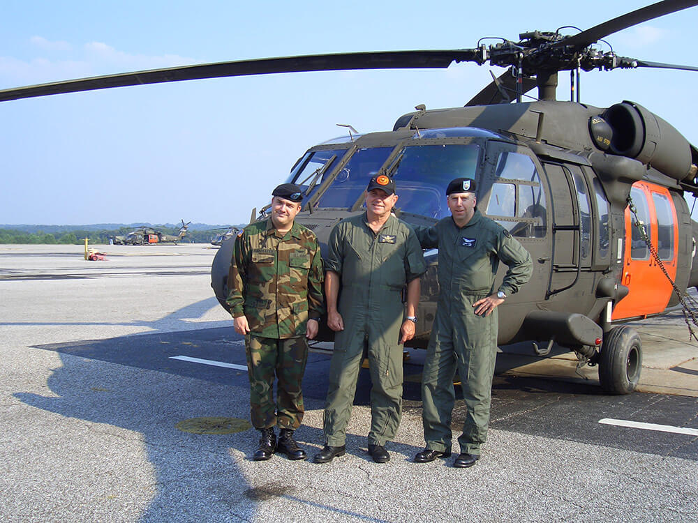 Then-MAJ Albert Thiem (right) shown summer of 2004 with fellow service members during a Black Hawk transition course at Ft. Rucker, Ala. Photo courtesy CW3 Albert Thiem