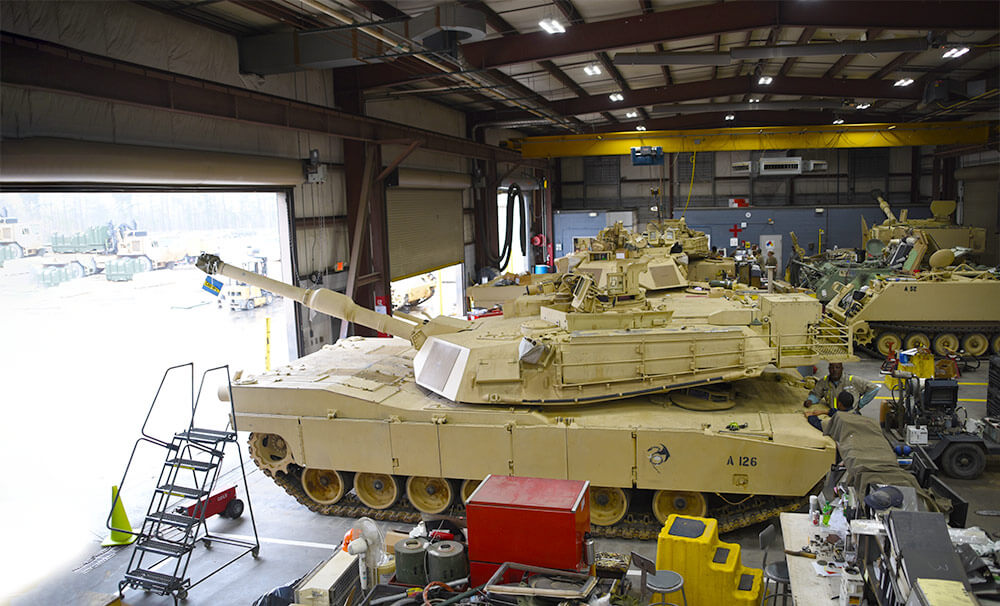 Dual-status technicians conduct vehicle maintenance and repairs on M1 Abrams tanks and other tracked vehicles in the maintenance bay at the South Carolina National Guard Unit Training Equipment Site on McCrady Training Center in Eastover, S.C. South Carolina Army National Guard photo by CPT Jessica Donnelly