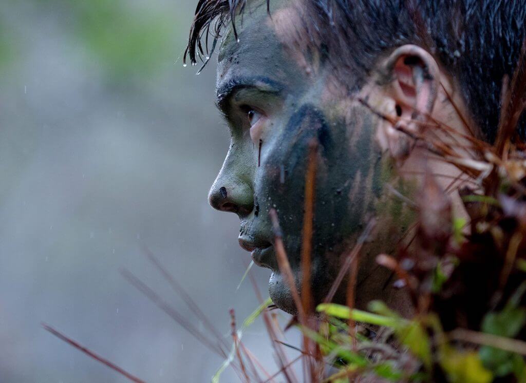 PFC William Snyder of the 1st Battalion 173rd Infantry Regiment, Alabama Army National Guard, uses sniper camouflage techniques as part of a woodland stalking training at Eglin AFB, Fla., April 2018. Alabama Army National Guard photo by SSG William Frye