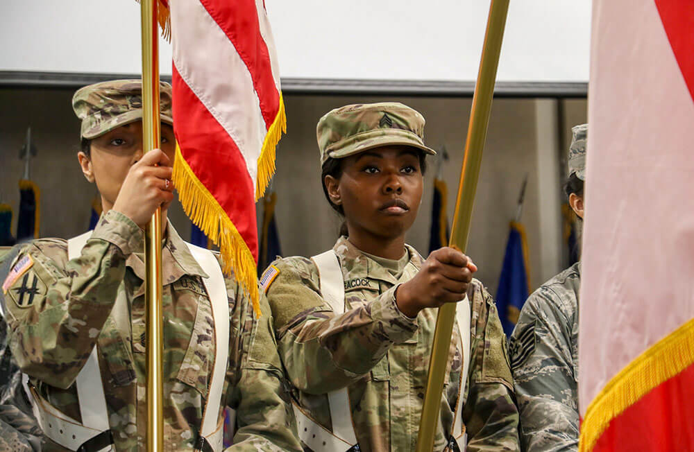 Georgia Army National Guard Soldiers participate as color guard in the Women’s History Month Observance at Clay National Guard Center, Marietta, Ga., March 2019. Georgia Army National Guard photo by SPC Tori Miller