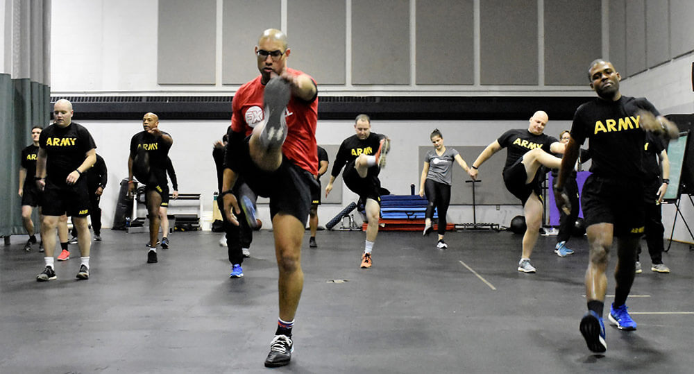 Soldiers of the 629th Military Intelligence Battalion receive instruction on proper stretching and warm-up techniques during the Fit Well fitness and physical training event held January 2019 at Camp Fretterd Military Reservation, Reisterstown, Md., as part of the battalion’s preparation for the upcoming Army Combat Fitness. Maryland Army National Guard photo by MAJ Kurt Rauschenberg