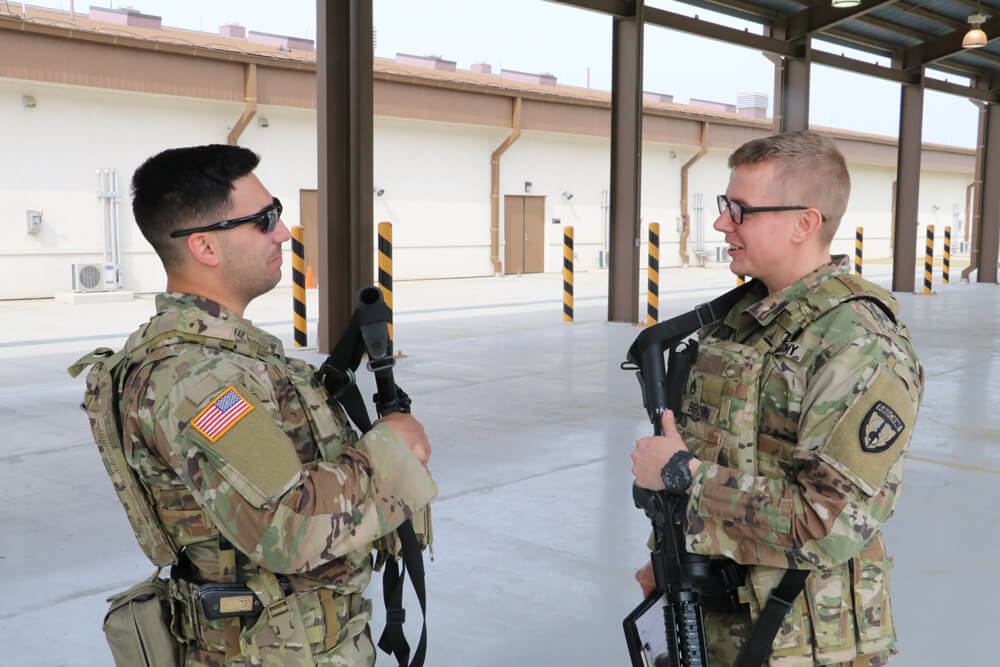 SPC Daniel Mize (left) and SSG Kyle Brown conduct an informal hotwash of their participation in one of the movement exercises routinely practiced by SOCKOR to ensure Soldiers' ability to "Fight Tonight" in response to hostilities on the Korean Peninsula, May 2019. U.S. Army photo by LTC John C Severns