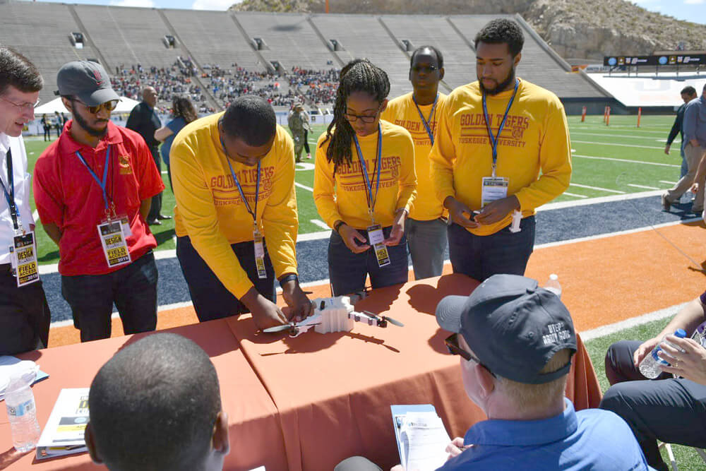 A team of students from Tuskegee University explains the design of their unmanned aerial vehicle to the judging panel during the U.S. Army’s HBCU/MI 2019 Design Competition.