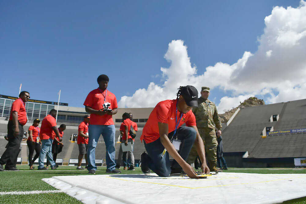 A student team from Grambling State University prepares an unmanned aerial vehicle for a flight demonstration as part of the U.S. Army’s HBCU/MI Design Competition, April 2019.