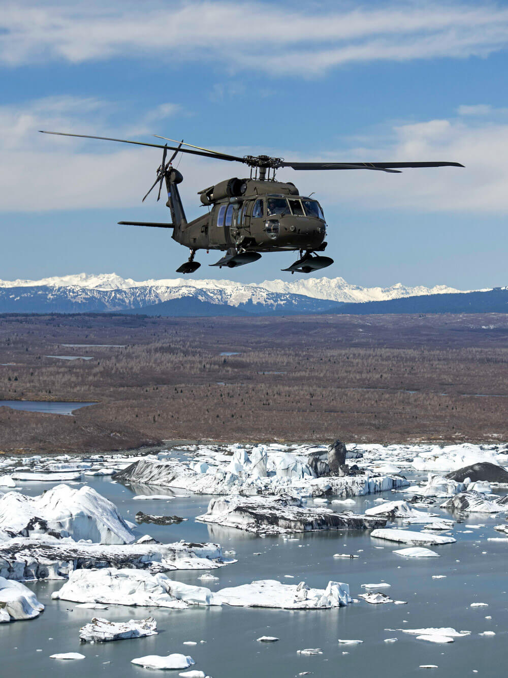 A 207th Aviation Battalion Alaska Army National Guard UH-60 Black Hawk makes a cross-country training flight from Anchorage to Juneau, Alaska, April 26, 2019. Alaska Army National Guard photo by 1LT Benjamin Haulenbeek