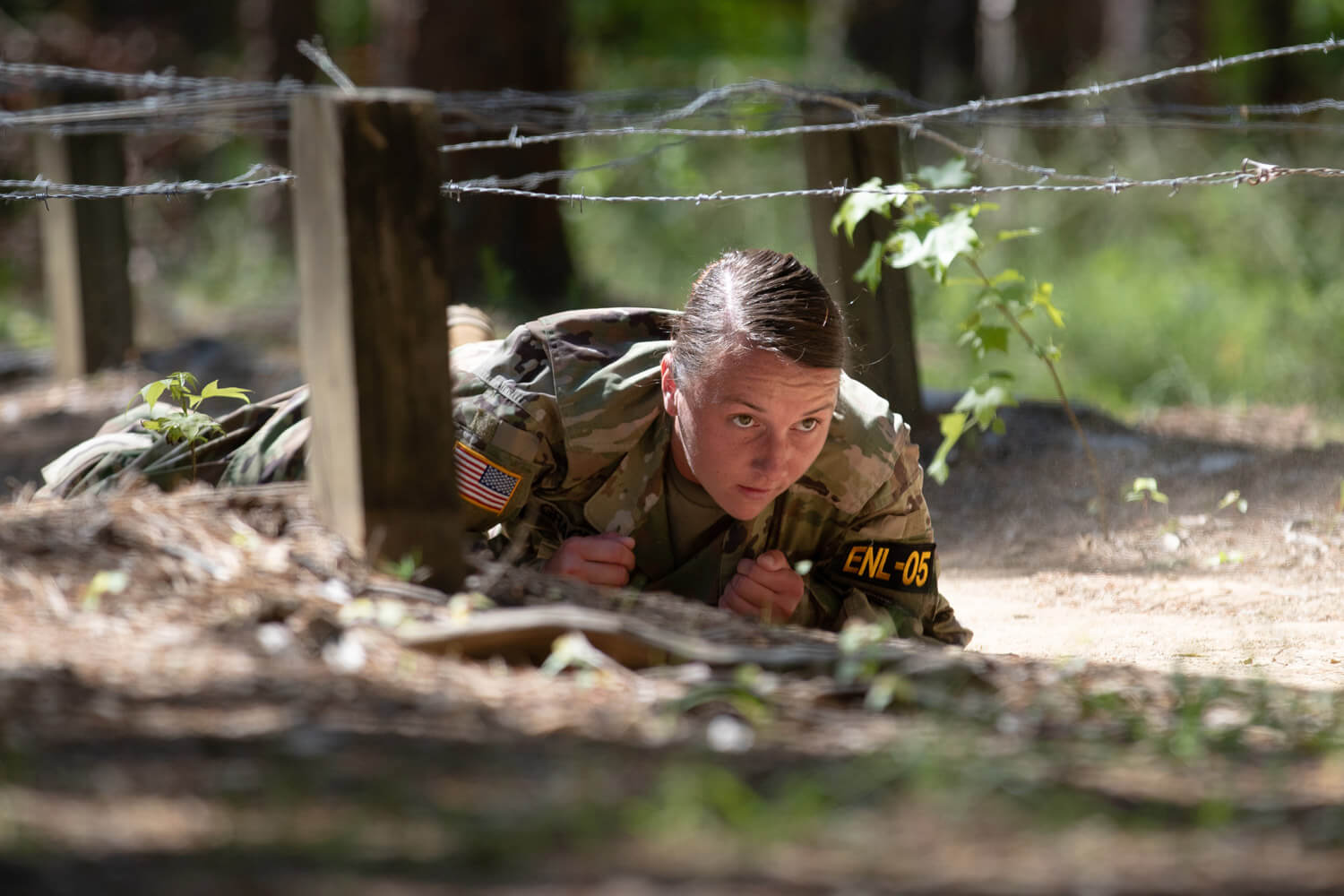 SPC Marina Grage, HHC, 890th Engineer Battalion, Mississippi National Guard, takes part in an obstacle course competition at Camp Butner, N.C., during Region III Best Warrior Competition on May 15, 2019. The five-day competition consists of tests of physical and mental endurance that include physical fitness, army warrior tasks and drills, land navigation, a road march, weapon qualification, a stress shoot course, urban operations, and the Noncommissioned Officer/Soldier review board. Alabama Army National Guard photo by SSG William Frye